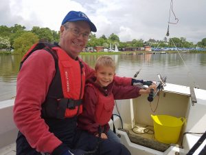 George Fenn enjoys a trial sail with Mervyn Clark, the club's Membership Secretary